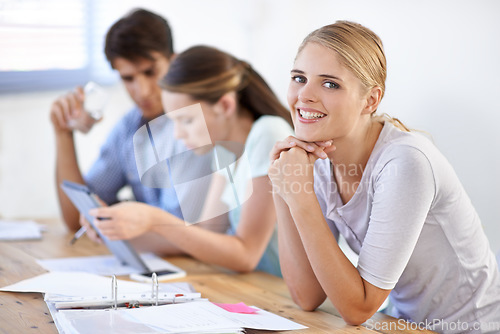 Image of Woman, portrait and smile in meeting, paperwork and planning or ideas for company. Business people, face and collaboration or support in workplace, happy and teamwork or communication and documents