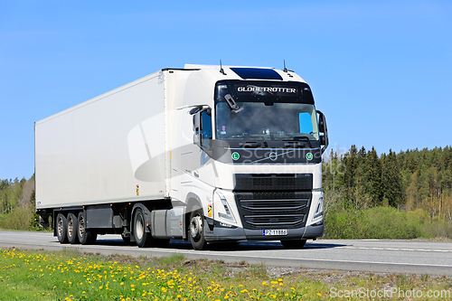 Image of New White Volvo FH Truck FRC Semi Trailer on Road