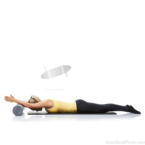 Image of Studio pilates, foam roller and fitness woman in floor exercise, stretching or sports wellness for core strength. Ground, mockup space and athlete equipment for workout support on white background