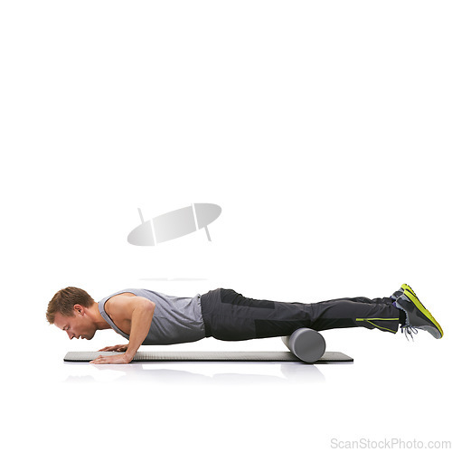 Image of Fitness, foam roller and man in floor push up for strength building, muscle growth or bodybuilding exercise. Plank balance workout, mockup studio space or training person isolated on white background