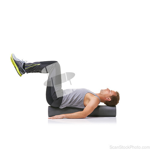 Image of Workout, foam roller and man in pilates back exercise, legs stretching or stability for sports rehabilitation, wellness or recovery. Floor, mockup space and studio athlete balance on white background