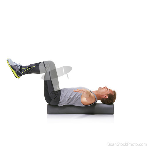 Image of Balance exercise, foam roller and man in pilates workout, stability and endurance performance. Floor, mockup studio space and athlete fitness for core muscle strength development on white background