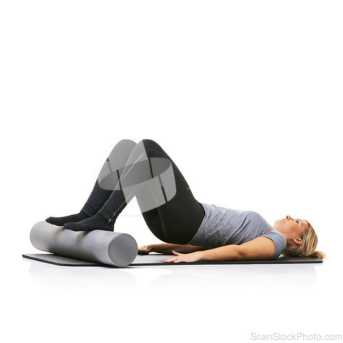 Image of Core workout, foam roller and studio woman with bridge exercise, activity or wellness for sports performance on floor. Ground, mockup space and girl fitness, training and yoga mat on white background