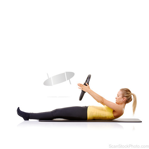 Image of Woman, pilates ring and arms for exercise training on yoga mat for resistance healthy, strength or studio white background. Female person, equipment for muscle flexibility, core balance or mockup