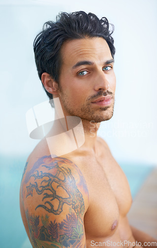 Image of Man, topless and portrait or confidence outdoor for cool style, edgy tattoo or relax muscles. Male person, face and shirtless outside or healthy fitness or calm at holiday vacation, beach or travel
