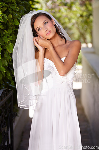 Image of Woman, wedding dress and outdoor for marriage celebration event, romance party or promise commitment. Female person, bride and veil in garden park or touch jewelry in love ceremony, elegant or summer