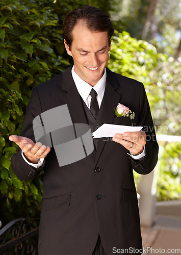 Image of Man, vows and outdoor at wedding ceremony for marriage commitment, promise speech or romance party. Male person, paper and reading as groom for partnership celebration, relationship trust or love