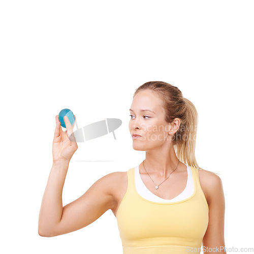Image of Woman, squeeze and stress ball in fitness for exercise against a white studio background. Serious female person in relief, tension or anger management in gym workout or training on mockup space