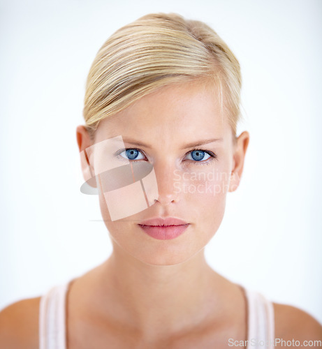 Image of Portrait, skincare and beauty of natural woman in studio isolated on a white background. Face, cosmetics and blonde model in spa facial treatment, dermatology or healthy skin glow, shine and serious