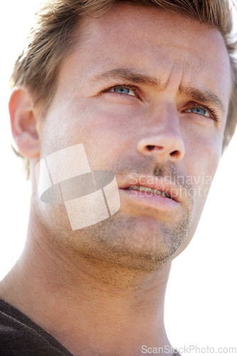 Image of Thinking, serious and handsome young man with brainstorming, ideas or planning facial expression. Young, confident and male person from Canada with wonder or dreaming face by white background.