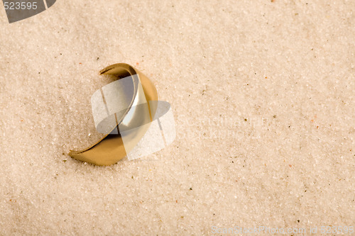 Image of Wedding Ring in Sand