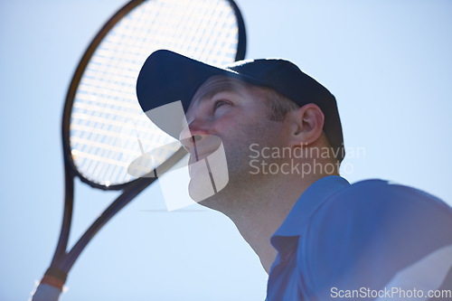 Image of Tennis match, fitness and man in outdoors, competition and playing on court at country club. Male athlete person, challenge and exercise or racket for game, performance and practice or cardio workout