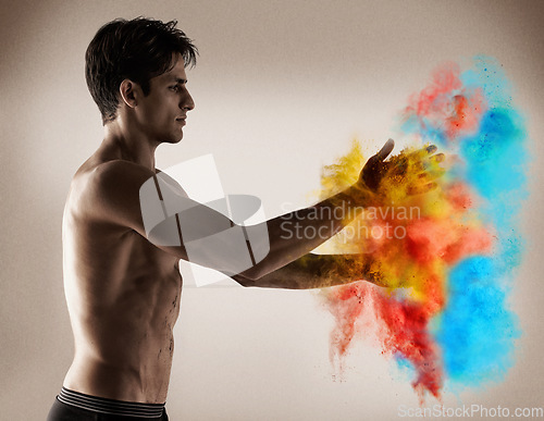 Image of Color, explosion and man with powder in hands with creativity, performance and studio. Vibrant, paint and shirtless model with bold cloud with blue, red and yellow smoke in background or backdrop