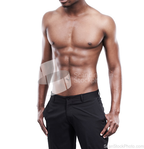 Image of Man, model and shirtless for fitness, six pack and standing on white background, confident and abs. Studio backdrop, fit and attractive for exercise, health and muscular for body, stomach and chest