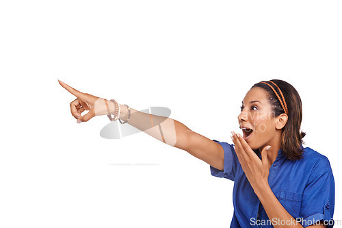 Image of Studio woman, surprise and pointing gesture at sales deal promotion, commercial or advertising news. Mockup space, announcement and shocked person react to wow notification offer on white background