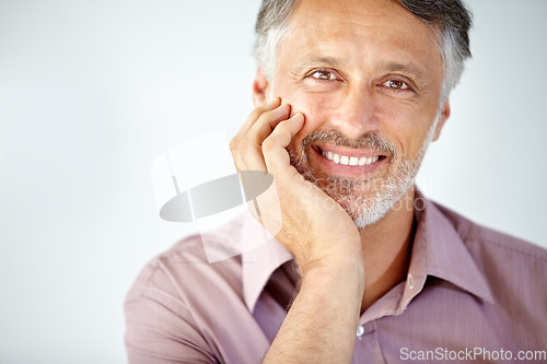 Image of Smile, portrait and mature businessman in a studio with positive, good and confident attitude. Happy, career and face of professional male lawyer with legal career isolated by gray background.