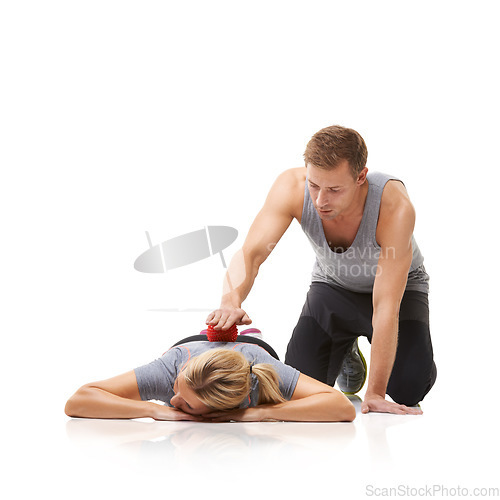 Image of Massage ball, back and physiotherapist and woman with a woman with sport, fitness and workout back injury. Physical therapy, man and wellness with health and helping with white background and studio