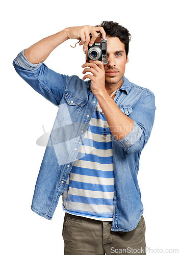 Image of Photography, portrait and man with a camera in a studio for creative or art career with confidence. Casual, vintage dslr equipment and young male photographer from Canada isolated by white background