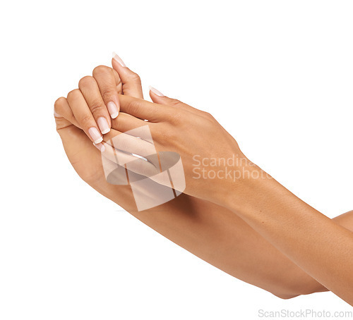 Image of Woman, hands or nails in studio with skincare for cosmetics, manicure or nail treatment for wellness. Person, fingers or mock up space for cosmetology, hygiene and smooth skin on white background