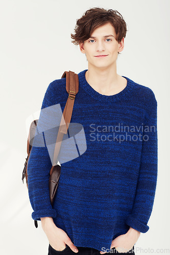 Image of Student, backpack and man portrait in studio with university, back to school and smile of male person. Study, college education and happy with learning and class fashion with bag and white background