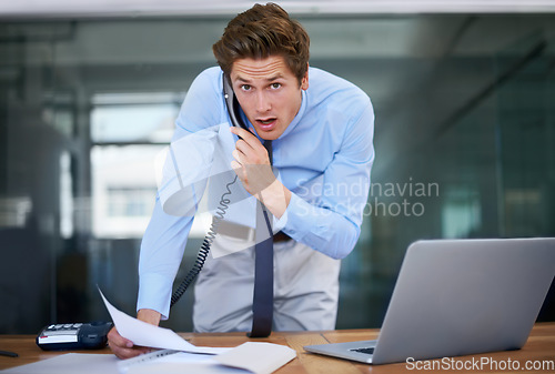 Image of Businessman, landline and discussion in office portrait, paperwork and communication or planning. Male professional, contact and networking on phone call for negotiation on business deal opportunity