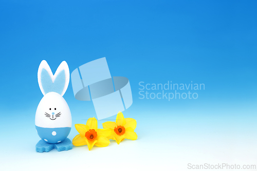 Image of Easter Bunny Egg with Spring Narcissus Flowers   