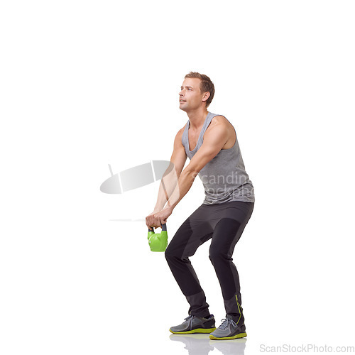 Image of Training, exercise and studio man with kettlebell for muscle growth, strength development or weightlifting routine. Gym equipment, weight lifting hard work and strong body builder on white background