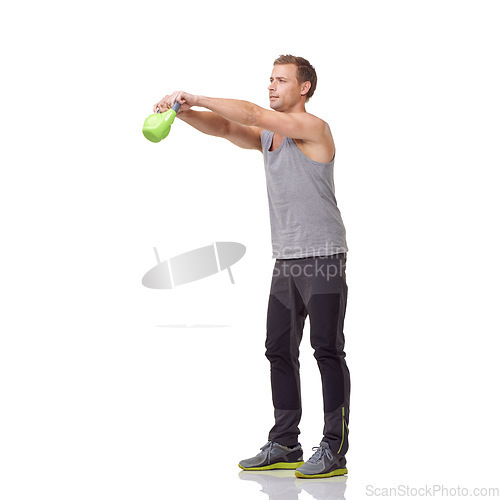 Image of Training, strong and studio man with kettlebell for arm muscle growth, strength power development or weightlifting routine. Gym equipment, active workout and male bodybuilder on white background