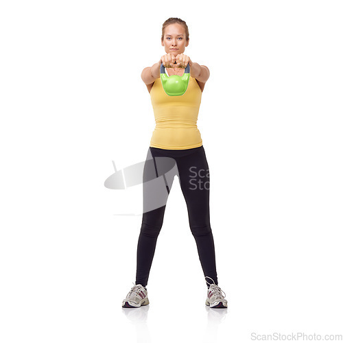 Image of Workout, portrait and woman exercise with kettlebell swing for muscle growth, arm strength or bodybuilding. Fitness studio, gym routine or athlete training for weightlifting goals on white background