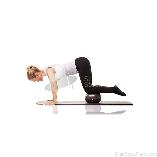 Image of Fitness, pilates and woman on floor with ball for exercise, body building care and health in studio. Gym, training and girl on mat with cardio, energy and muscle workout isolated on white background