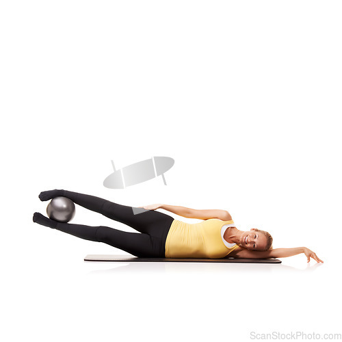 Image of Woman, portrait and ball or legs wellness for abductor squeeze exercise, strong thighs or white background. Female person, face and equipment in studio for health balance, lifting or mockup space