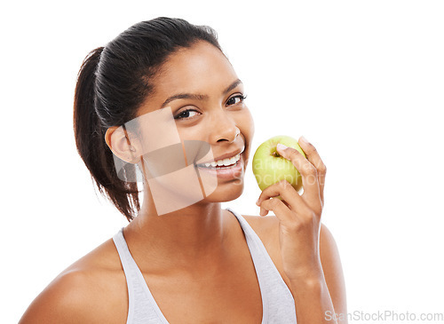 Image of Happy woman, apple and eating of healthy food for nutrition, detox and wellness in a studio portrait. Young african person with green fruit for healthcare, lunch or vegan choice on a white background