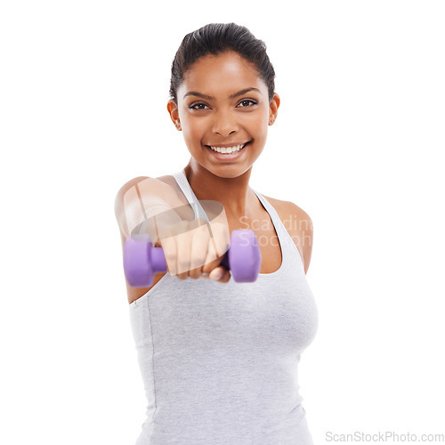 Image of Exercise, happy woman and dumbbell in studio portrait for health, workout and fitness or gym power. Young bodybuilder or a sports person in training, strong and muscle wellness on a white background