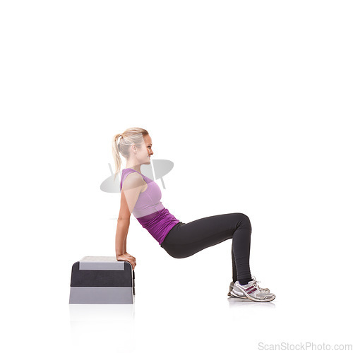 Image of Woman, aerobics step and exercise in studio profile with smile, training or health by white background. Girl, person and mockup space for workout, fitness or wellness on floor with balance for muscle