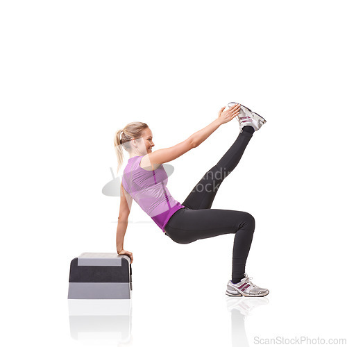 Image of Woman, aerobics step and training in studio profile with smile, exercise or health by white background. Girl, person and mockup space for workout, fitness or wellness on floor with balance for muscle