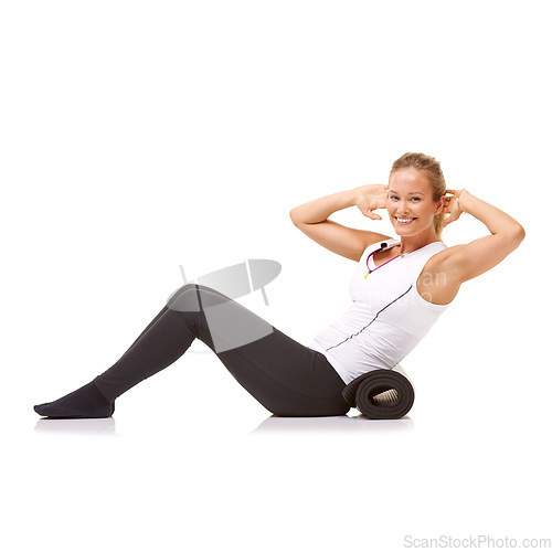 Image of Woman, fitness and mat in studio for sit ups, pilates or workout for healthy body, wellness and core muscle. Person, portrait and yoga or smile for abdomen health on mockup space and white background