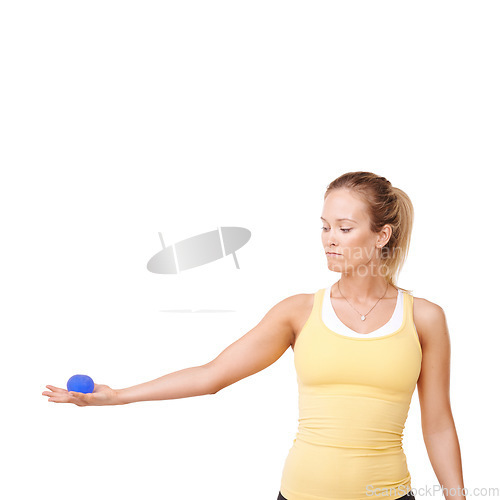 Image of Stress ball, health and woman in studio for mindful, fitness and arm exercise with focus. Squeeze, sport equipment and young female person from Canada with anxiety relief isolated by white background