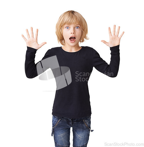 Image of Portrait, wow or surprise with a young girl in studio isolated on white background for reaction. Emoji, kids and amazing with an excited blonde child looking shocked by a notification or announcement