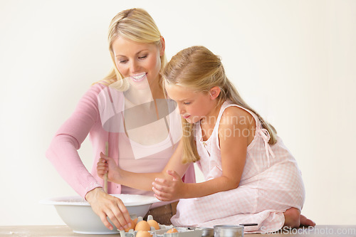 Image of Eggs, baking and happy mom, child or family make dessert, food or prepare recipe, wheat flour or ingredients. Kitchen, bowl and young kid girl learning home cooking together for Mothers Day bonding