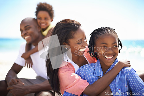 Image of Smile, love and black family at the beach together for tropical vacation, adventure or holiday. Happy, travel and young African parents with girl children by the ocean for bonding weekend trip.