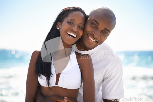 Image of Black couple, smiling and hug with portrait, beach and married for summer vacation. African, enjoying and happy for holiday, sun tan and seaside in outdoor, beautiful and day off in costal city