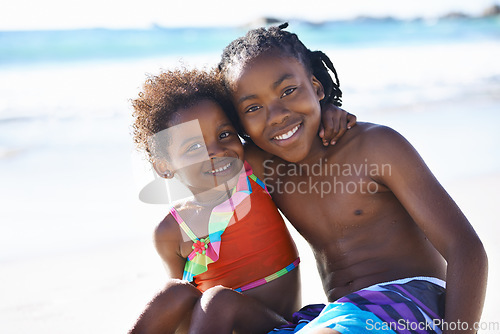Image of Portrait, black kids and happiness on beach with costume for adventure, holiday or vacation in summer. African sibling, face and smile outdoor in nature for break, experience or bonding with embrace