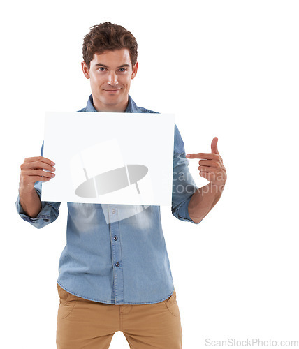 Image of Pointing, poster and portrait of man in a studio with mockup space for marketing, promotion or advertising. Happy, banner and handsome person from Canada with empty sign isolated by white background.