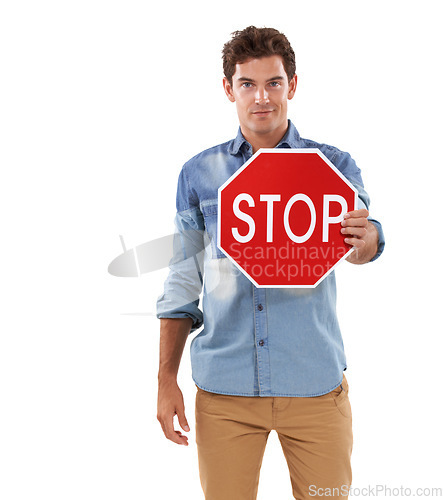 Image of Portrait, man and traffic stop sign in studio isolated on a white background mockup space. Person show red octagon symbol, forbidden warning signal and caution, attention and security in protection