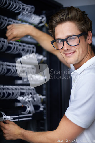 Image of Server room, information technology and man in portrait for connectivity, night and job. Cybersecurity system, it network or person for fiber internet, data center and storage with cable connection