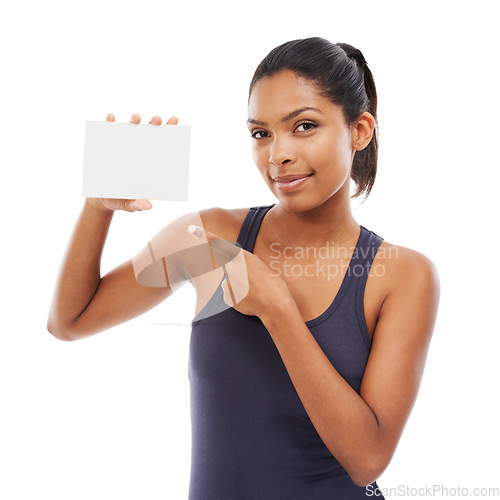 Image of Blank, card and portrait of woman pointing to advertising, poster or mock up space in white background of studio. Indian, model and hand gesture to sign, post and paper for promotion or information