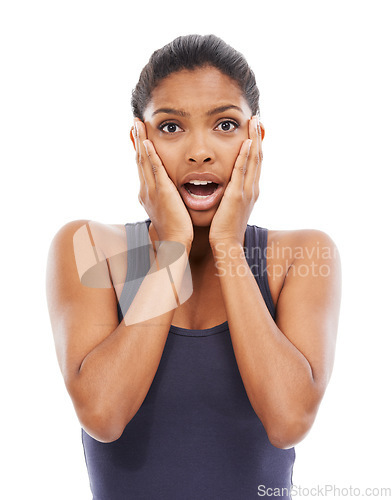 Image of Portrait, wow and shock with a young woman in studio isolated on a white background for reaction. Face, news and surprise with a young person looking amazed by an announcement or notification