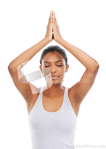 Image of Woman, yoga and namaste pose in studio, peace and spiritual awareness or mindfulness. Happy person, meditation and exercise or fitness for wellness, relaxing and chakra or breathe by white background