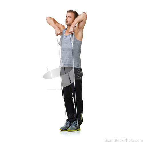 Image of Workout, man and stretching a resistance band in studio, gym and fitness training for strong muscles. Sports person, exercise and commitment by gym equipment in mockup and cardio by white background