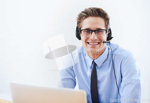 Image of Business man, call center portrait and computer for virtual communication, customer service or support. Professional agent, consultant or advisor with FAQ or contact us on a wall or white background